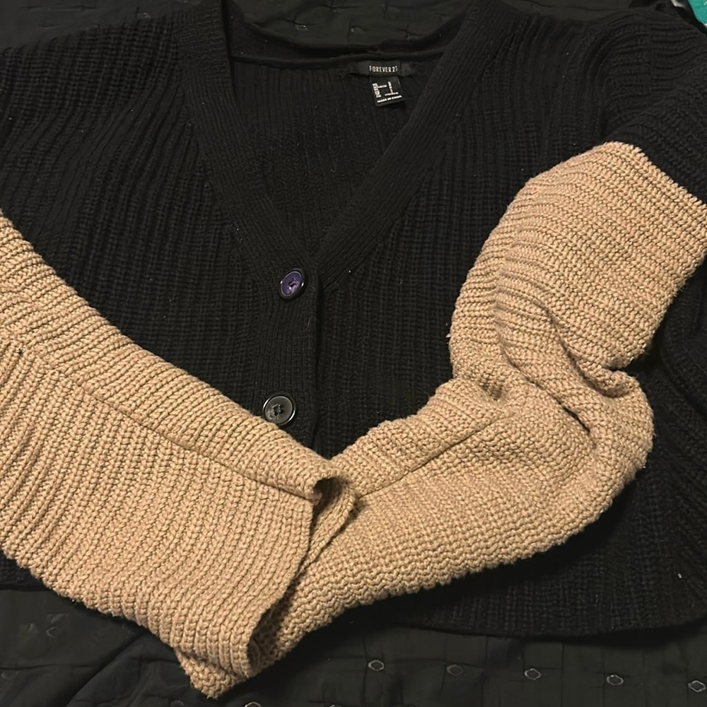Black cropped button up sweater with brown sleeves
